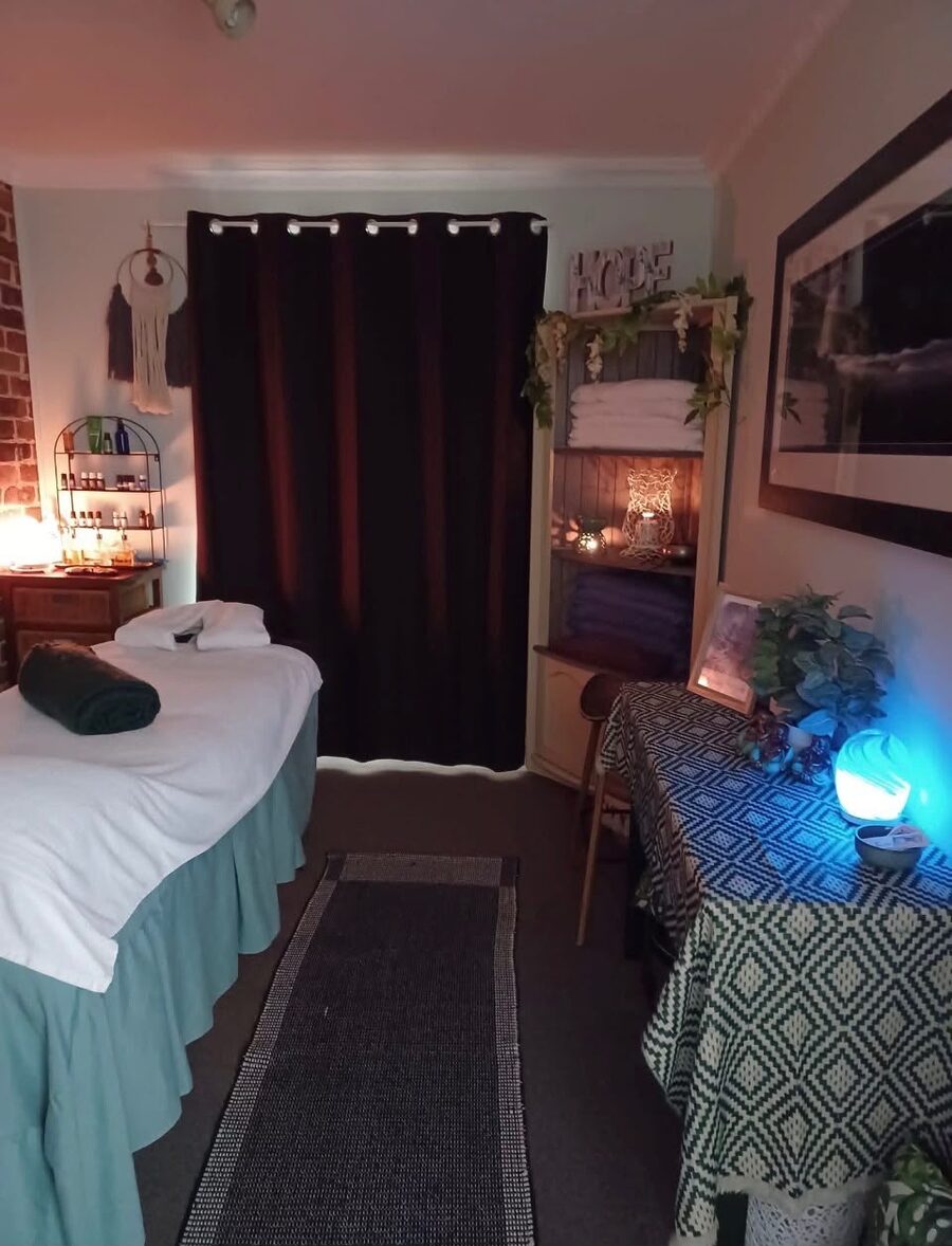 The treatment room in the evening, lit softly by a salt lamp